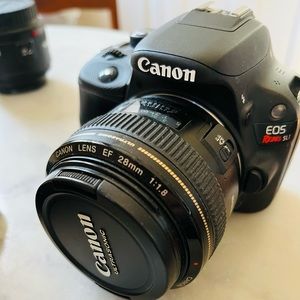 Canon EOS Rebel SL1 with 28mm lens, 50mm lens and charger
